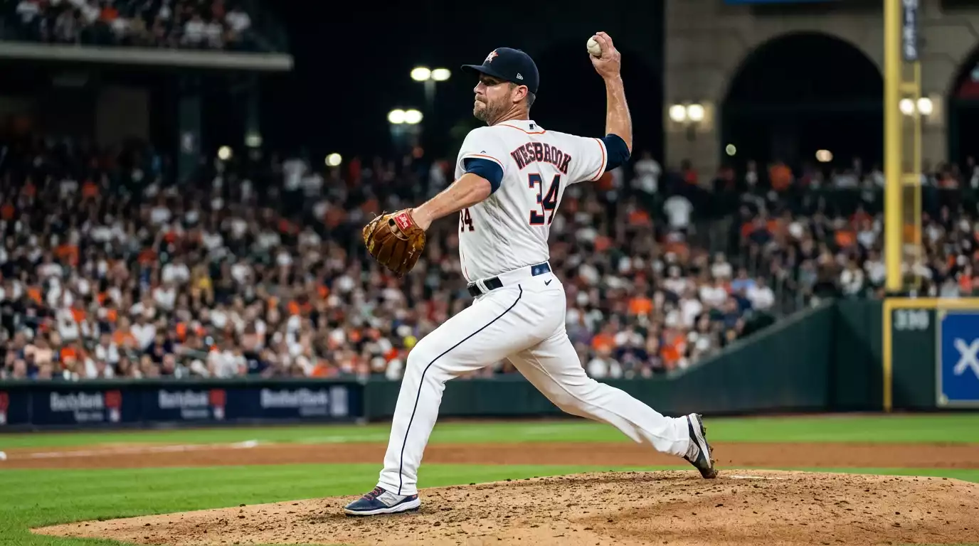 Major League Baseball starting pitcher in mid-windup on the mound during a home game